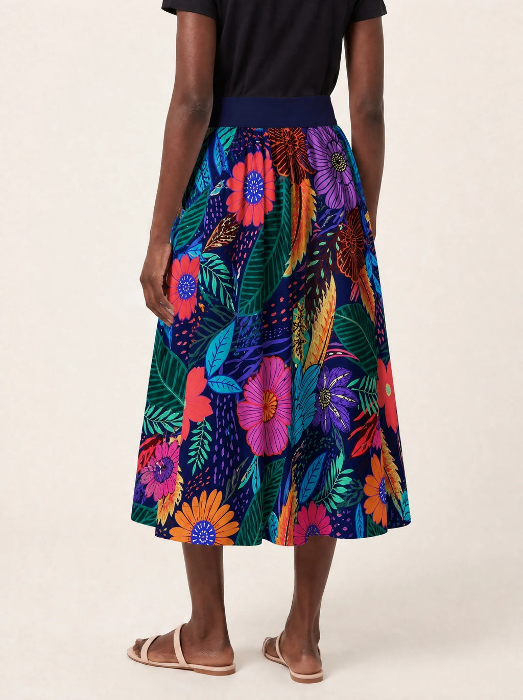 "Bustani" Twirl Skirt — cropped back view on model
