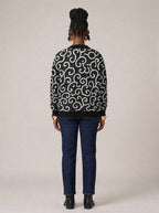"Duara" Cardigan — back view on model