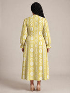 "Oshun Dhahabu" Long Puff Sleeve Dress — back view on model