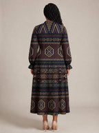 "Msuko" Long Puff Sleeve Dress — back view on model