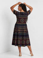 "Msuko" Sweetheart Midi Dress — back view on model