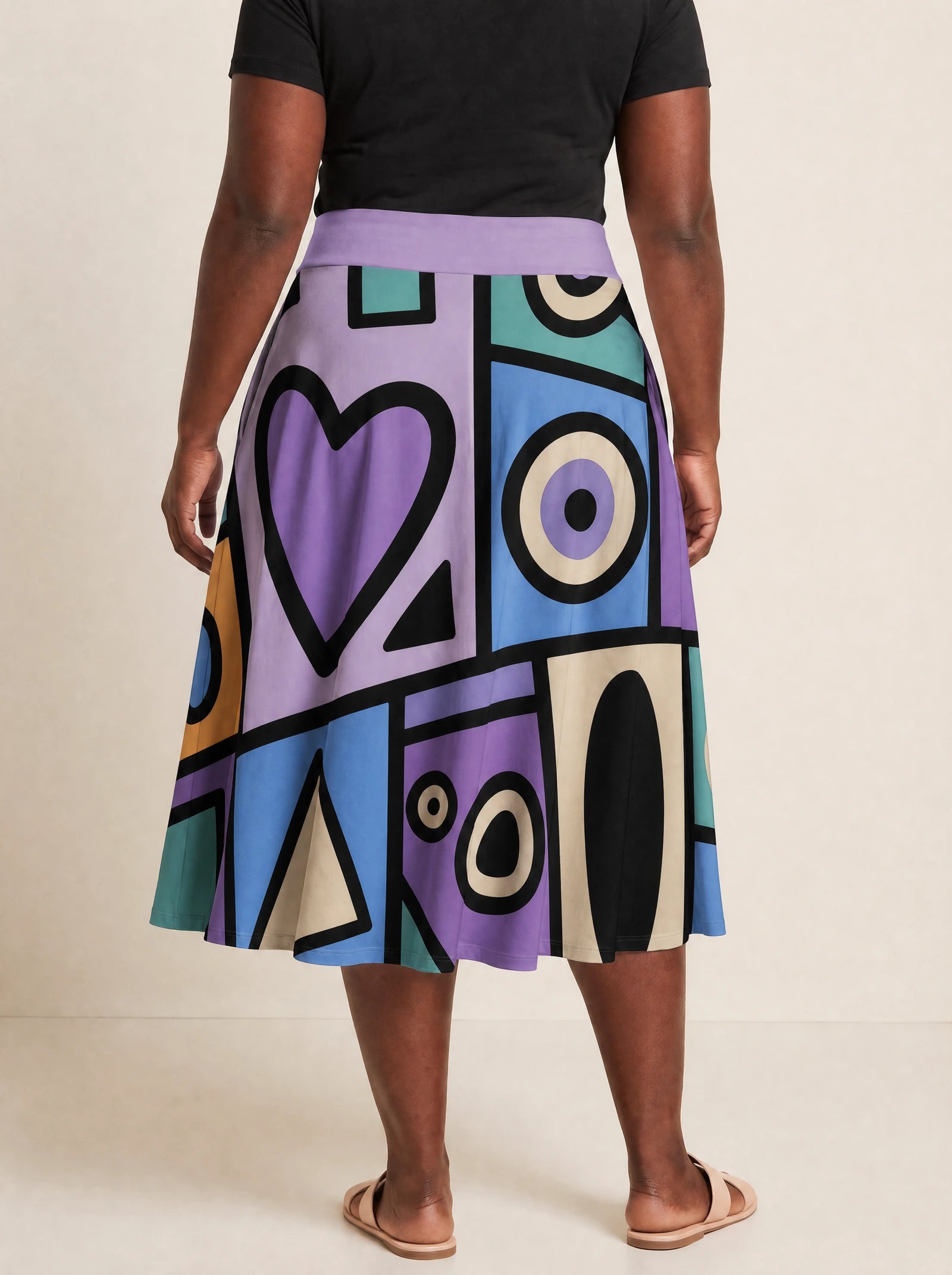 "Sanaa" Twirl Skirt — cropped back view on model