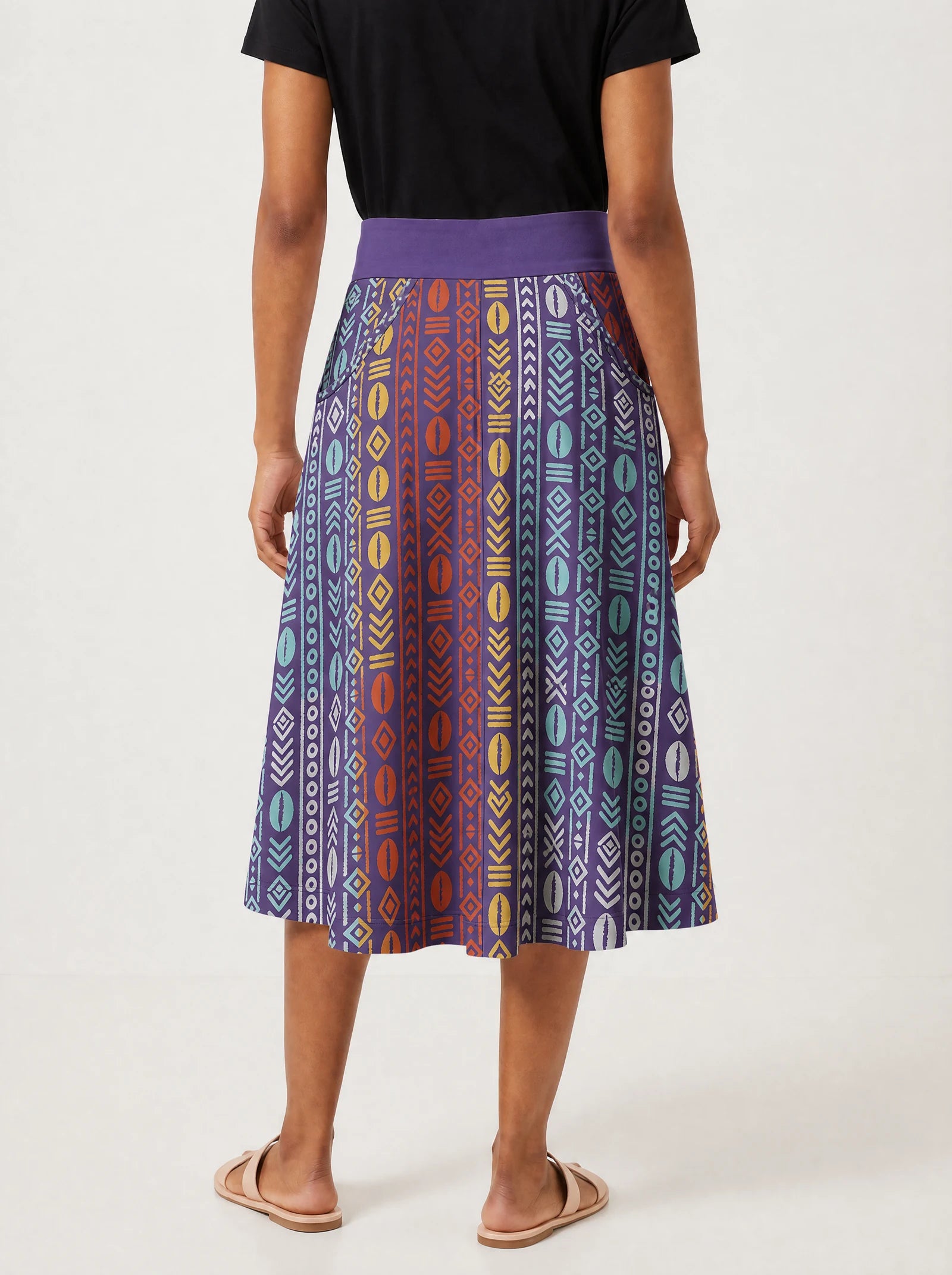 "Oshun Zamani" Twirl Skirt — cropped back view on model