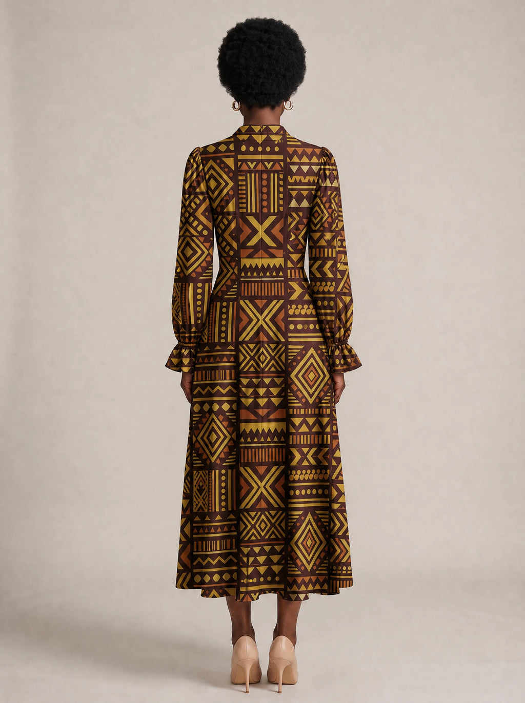 "Mudcloth" Long Puff Sleeve Dress — back view on model