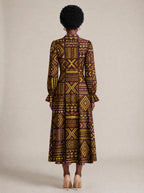 "Mudcloth" Long Puff Sleeve Dress — back view on model