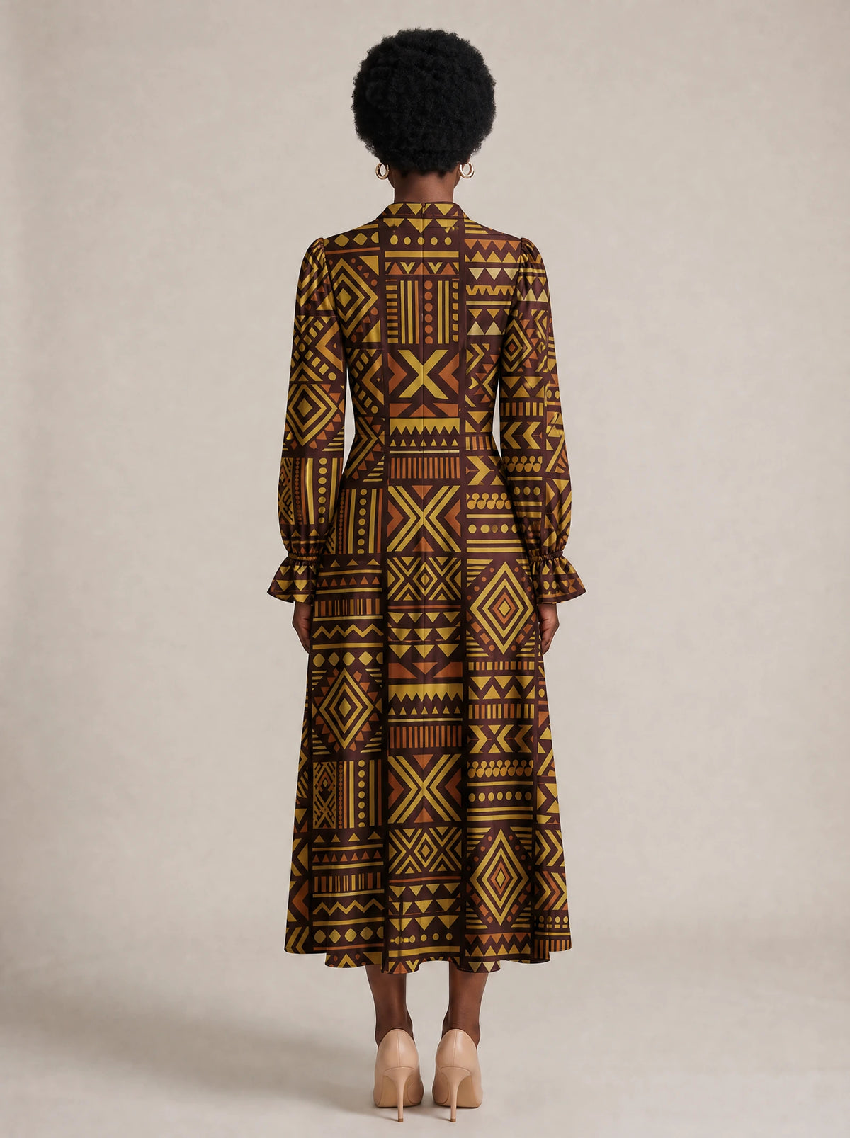 "Mudcloth" Long Puff Sleeve Dress — back view on model