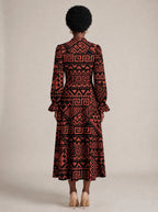 "Shaka" Burgundy Long Puff Sleeve Dress — back view on model