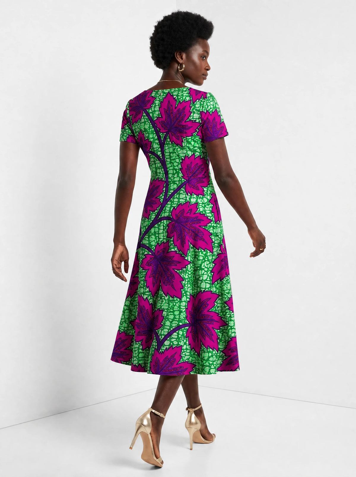 "Mzabibu" Sweetheart Midi Dress — back view on model