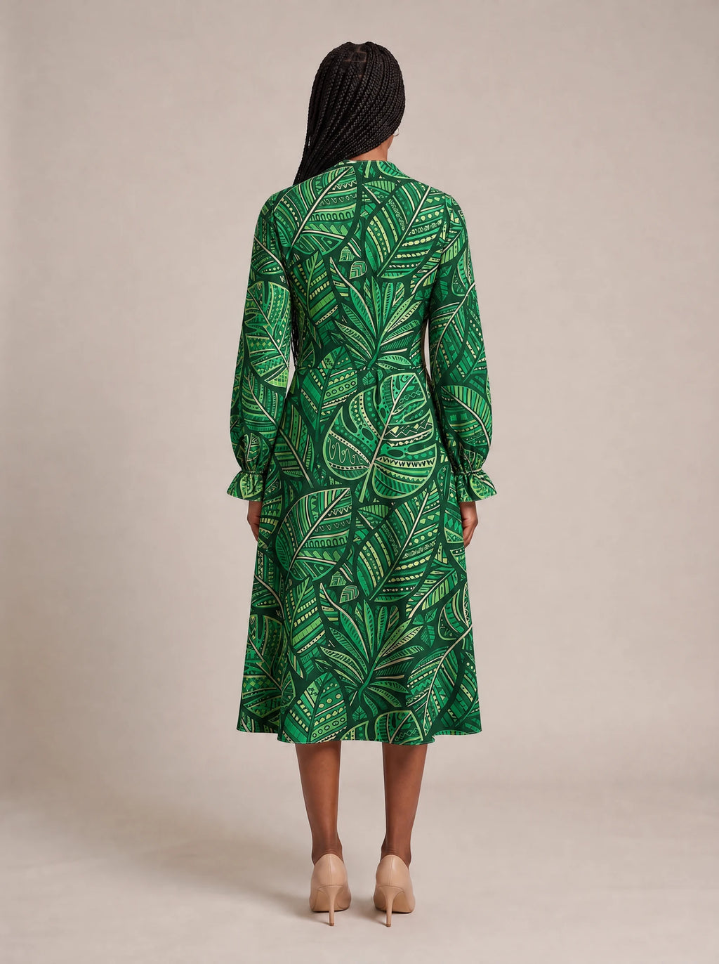"Asili" Emerald Long Puff Sleeve Dress — back view on model