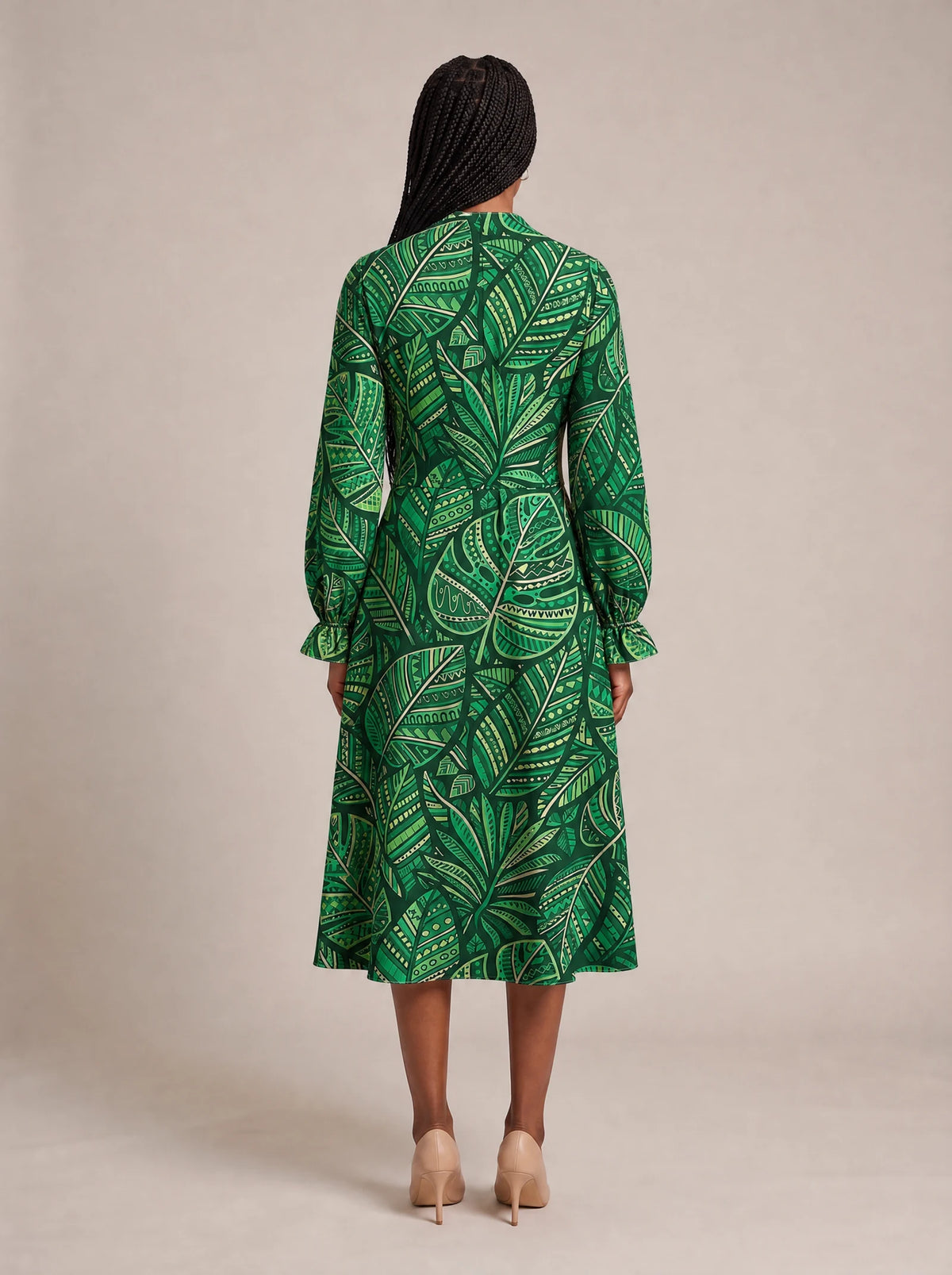 "Asili" Emerald Long Puff Sleeve Dress — back view on model