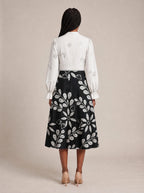 "Kivuli" Long Puff Sleeve Dress — back view on model