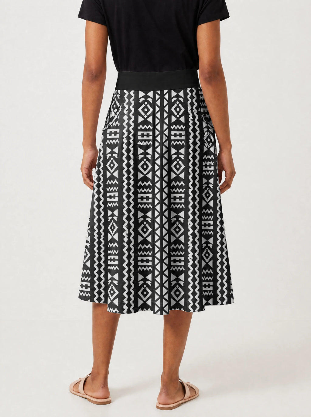 "Kuba" Twirl Skirt — cropped back view on model