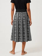 "Kuba" Twirl Skirt — cropped back view on model