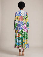 "Kisiwa" Long Puff Sleeve Dress — back view on model