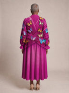 "Kipepeo" Long Puff Sleeve Dress — back view on model