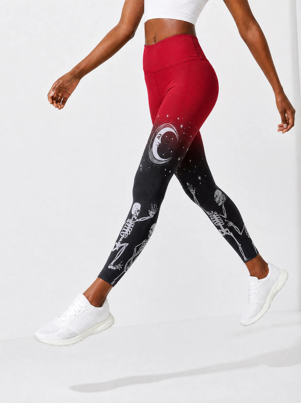 "Mwezi" Halloween Leggings — side view on model, walking