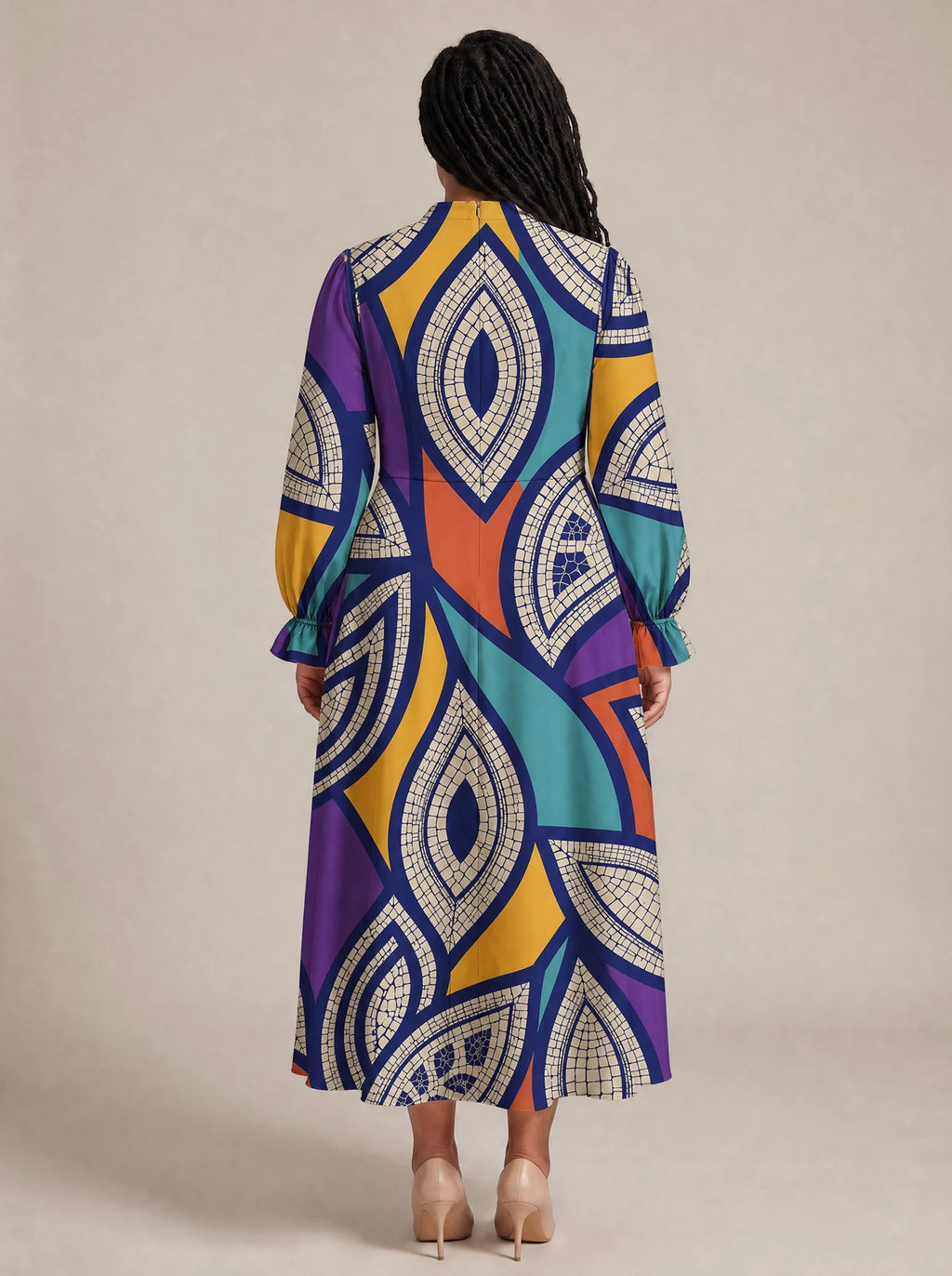 "Johari" Long Puff Sleeve Dress — back view on model