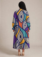 "Johari" Long Puff Sleeve Dress — back view on model