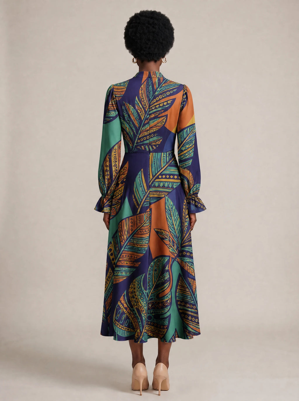 "Majani" Long Puff Sleeve Dress — back view on model