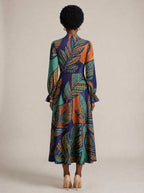 "Majani" Long Puff Sleeve Dress — back view on model