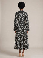 "Duara" Long Puff Sleeve Dress — back view on model