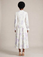 "Urujuani" Long Puff Sleeve Dress — back view on model
