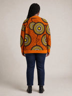 "Mchana" Knitted Cardigan — back view on model