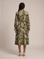 "Ashanti" Long Puff Sleeve Dress — back view on model