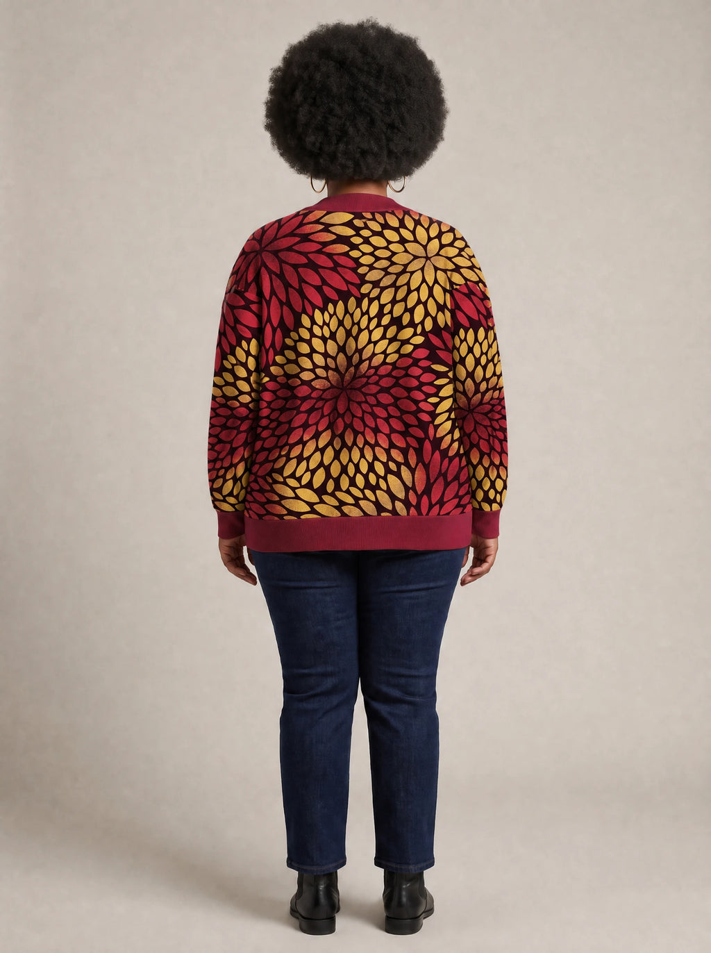 "Mavuno" Cardigan — back view on model