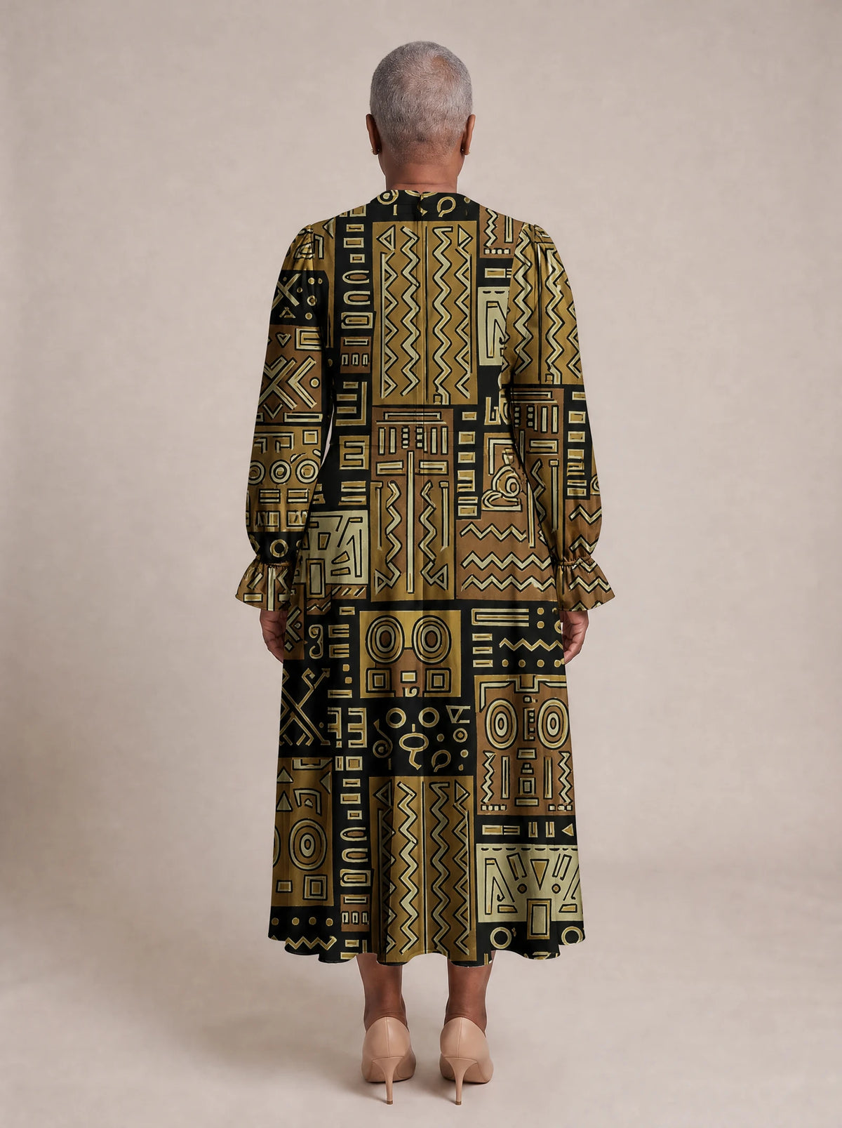 "Sankofa" Long Puff Sleeve Dress — back view on model