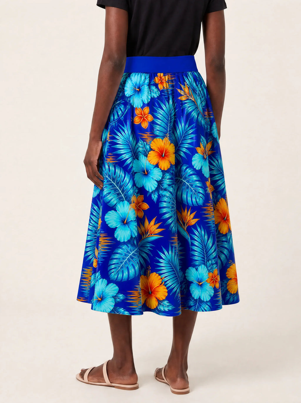 "Maua" Twirl Skirt — cropped back view on model