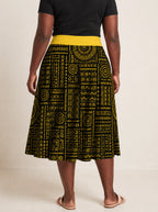 "Lamu" Twirl Skirt — cropped back view on model