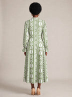 "Oshun Verde" Long Puff Sleeve Dress — back view on model