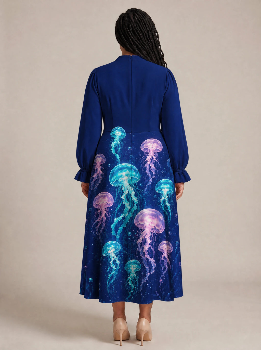 "Bahari" Long Puff Sleeve Dress — back view on model