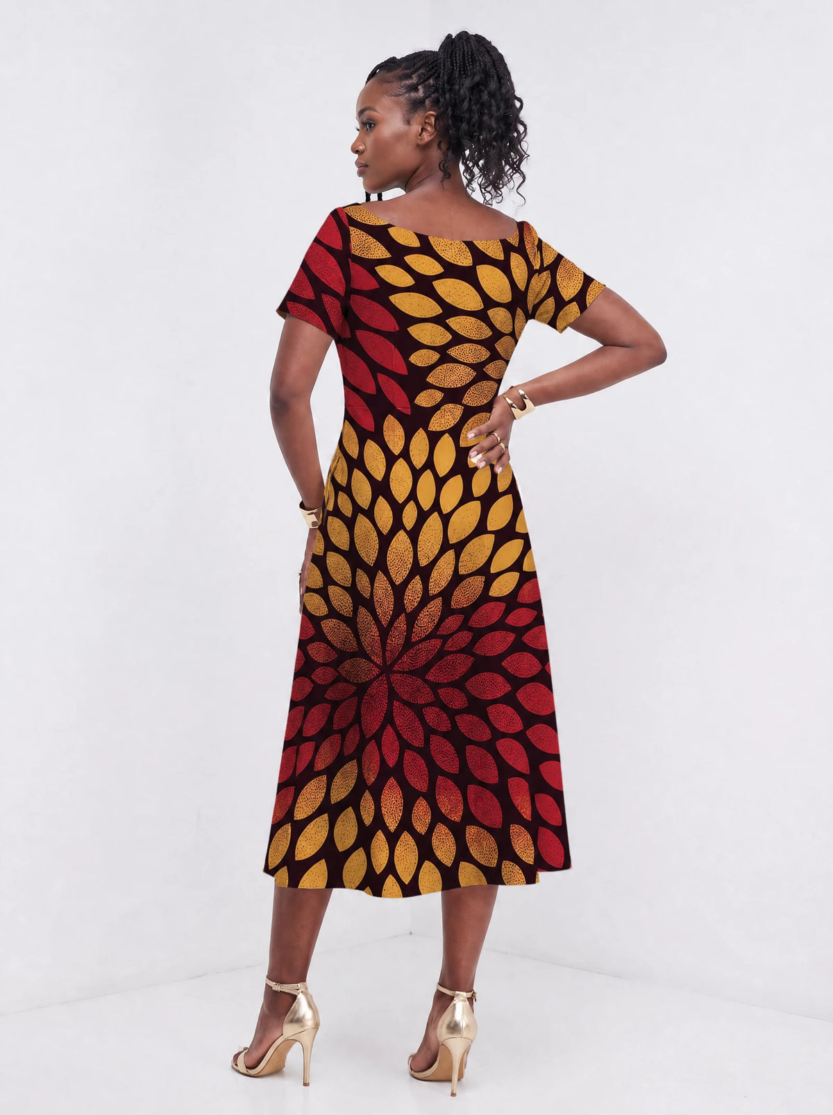 "Mavuno" Sweetheart Midi Dress — back view on model