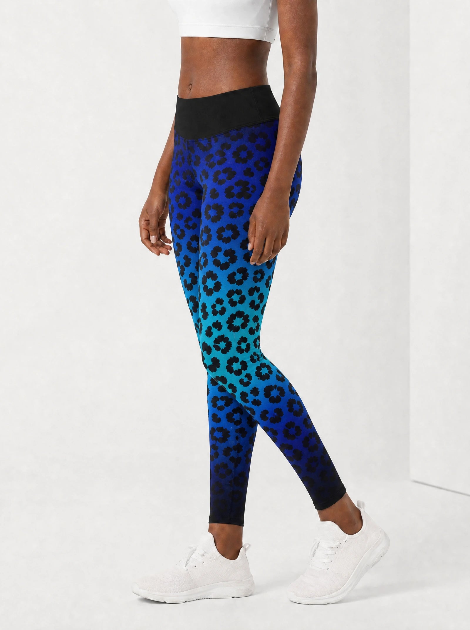 "Unstoppable" Sapphire Leopard Leggings — side view on model