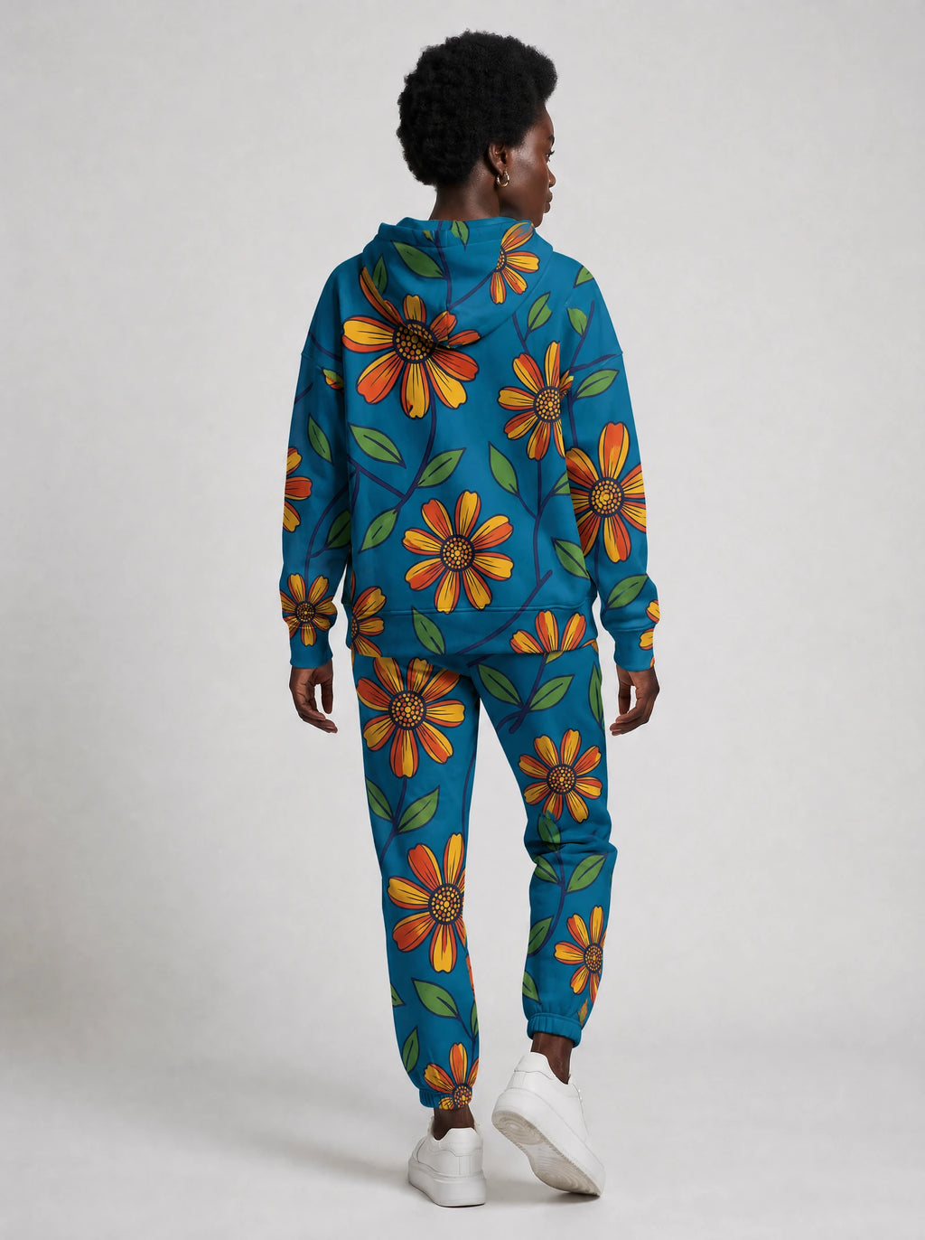 "Kitalu" Teal Poppy Hoodie & Jogger Set — back view on model