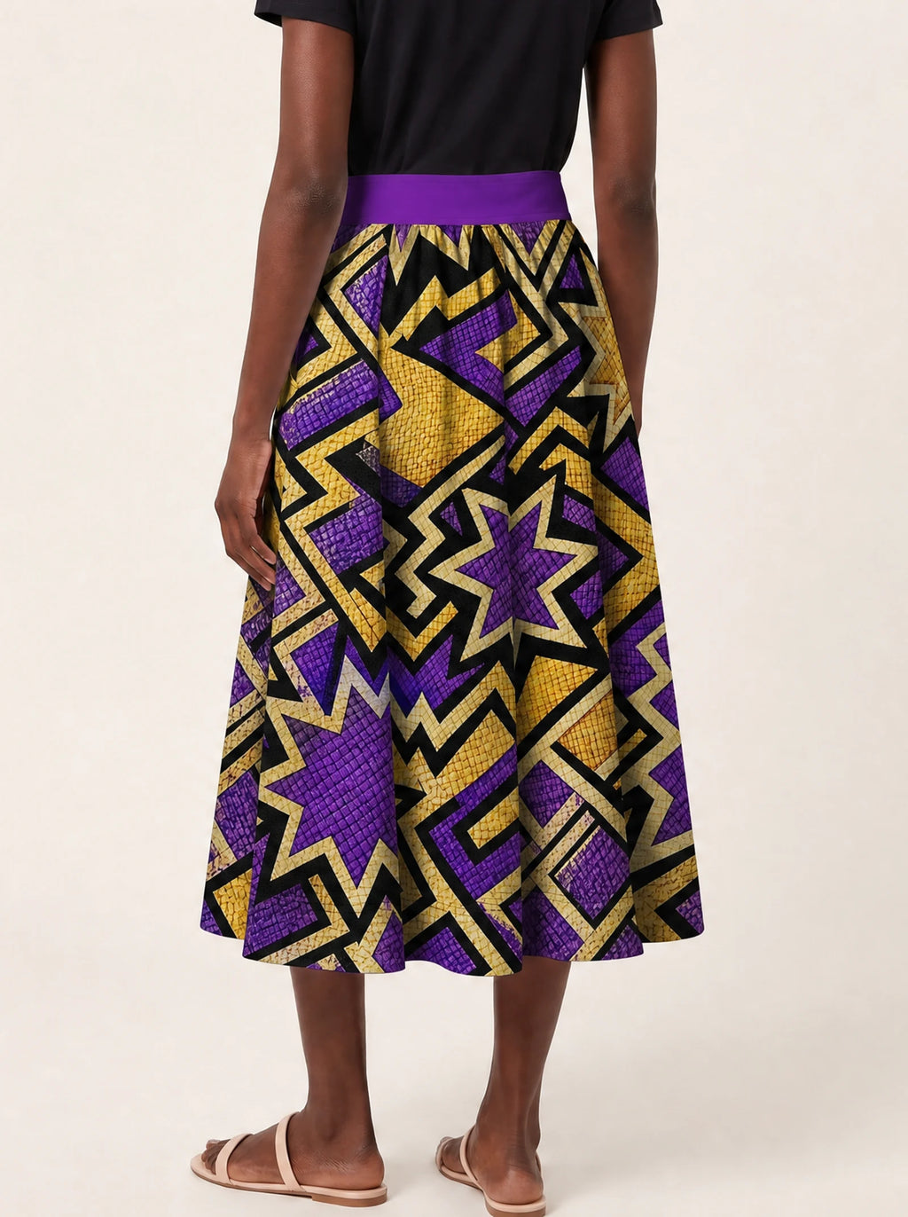 "Sheba" Twirl Skirt — cropped back view on model