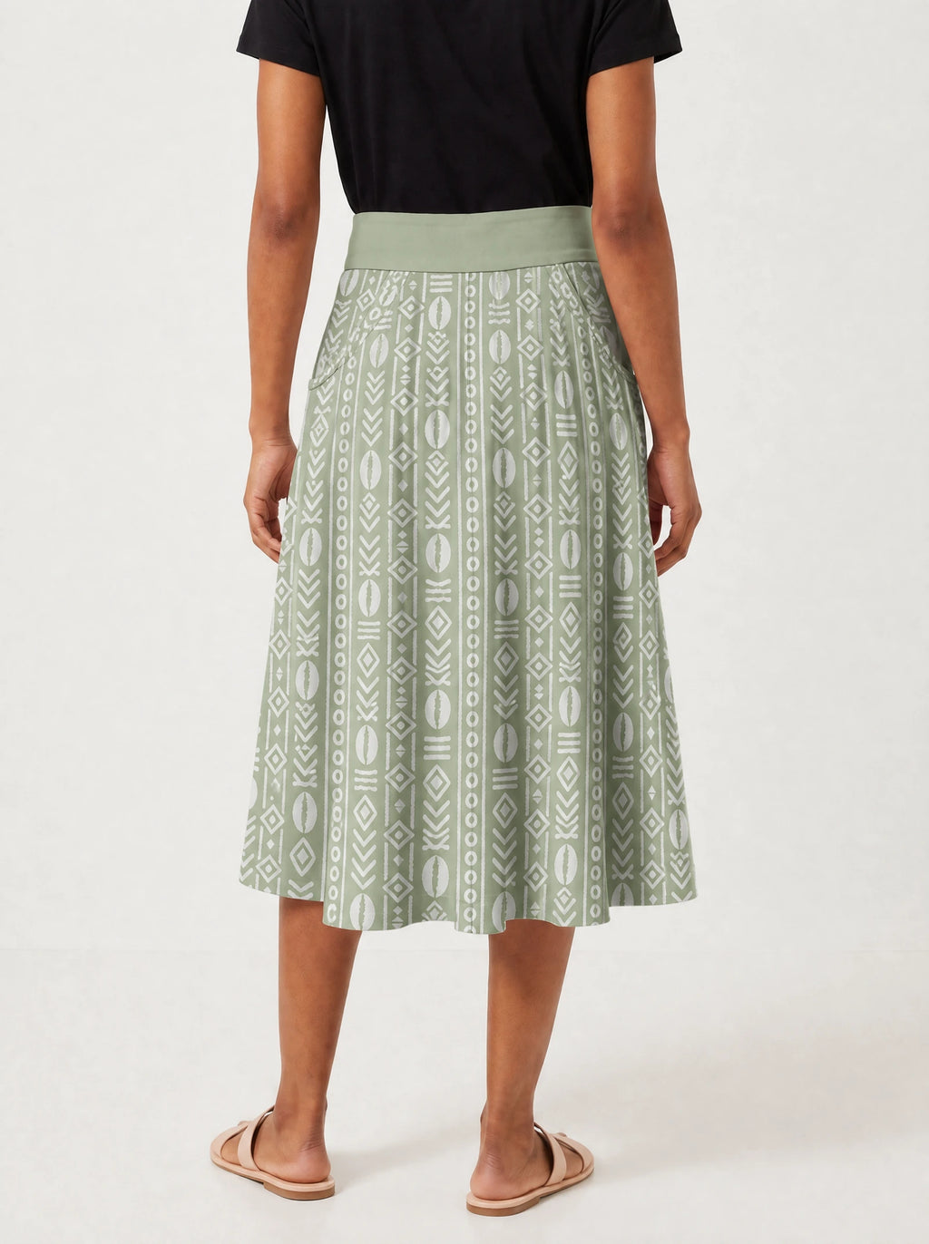 "Oshun Verde" Twirl Skirt — cropped back view on model