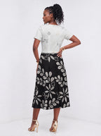 "Kivuli" Sweetheart Midi Dress — back view on model