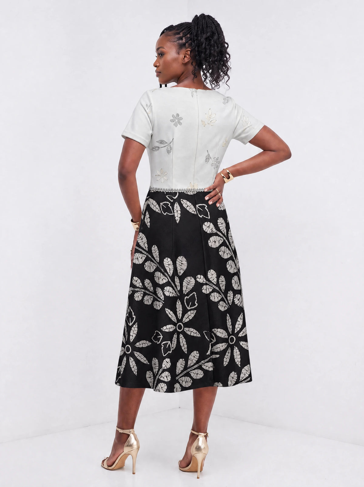 "Kivuli" Sweetheart Midi Dress — back view on model