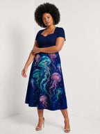 "Bahari" Sweetheart Midi Dress — three-quarter view on model