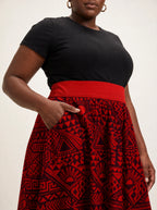 "Shaka Burgundy" Twirl Skirt — close-up of the waistband and side pocket