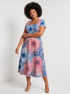 "Samawati" Sweetheart Midi Dress — three-quarter view on model