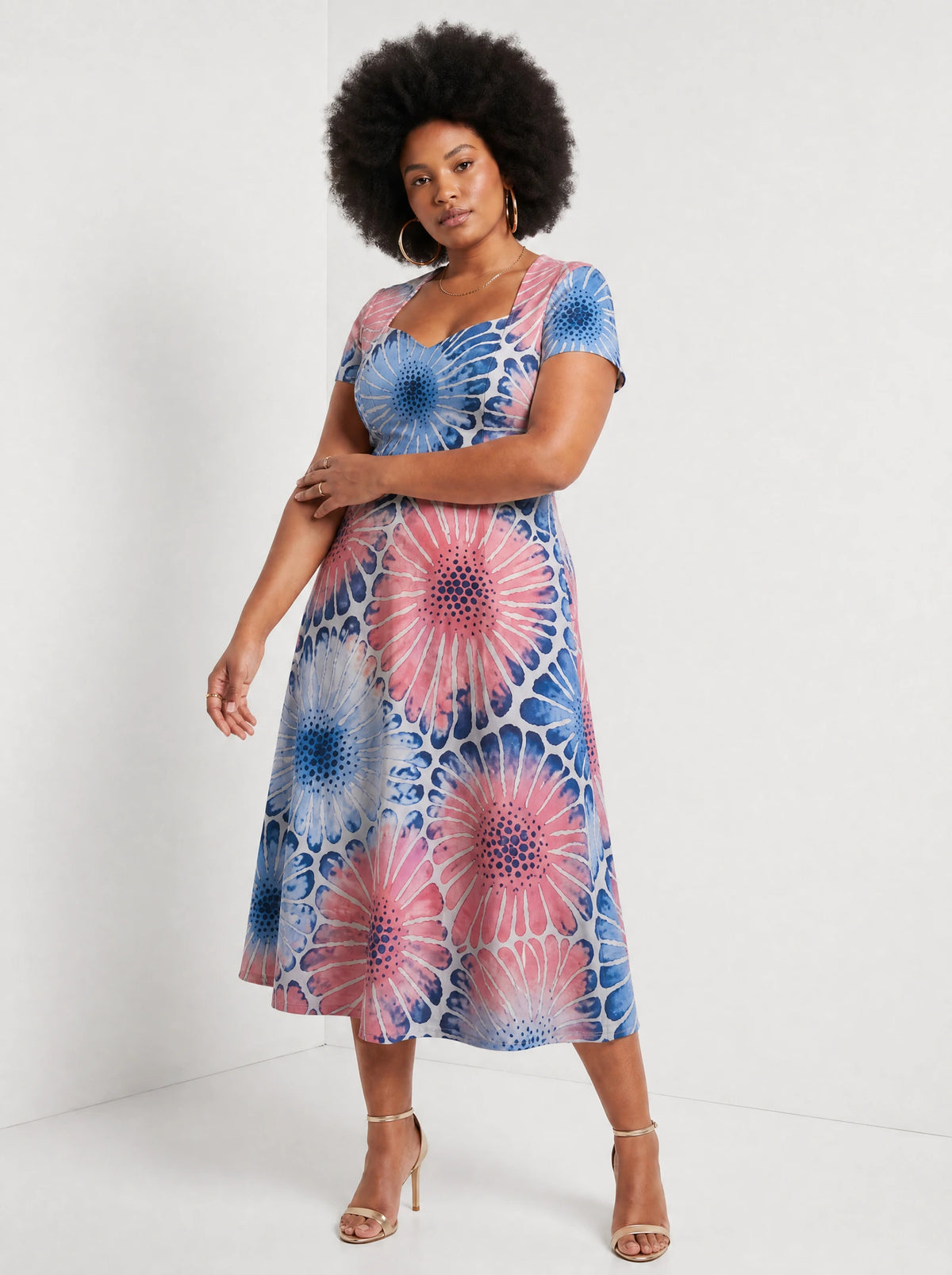 "Samawati" Sweetheart Midi Dress — three-quarter view on model