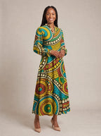 "Taji" Long Puff Sleeve Dress — walking, three-quarter view on model