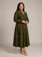 "Lamu" Long Puff Sleeve Dress — walking, three-quarter view on model