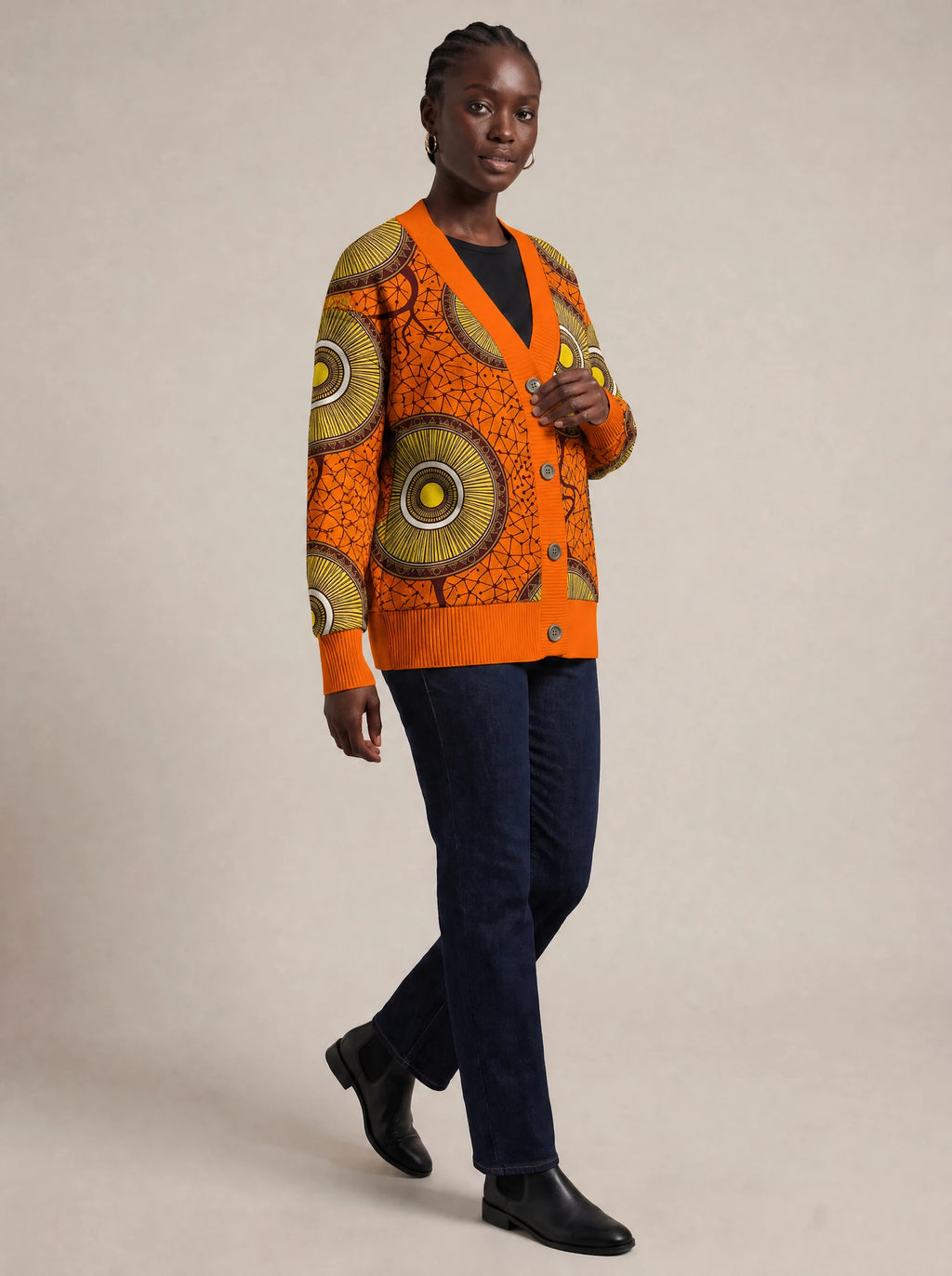 "Mchana" Knitted Cardigan — three-quarter view on model