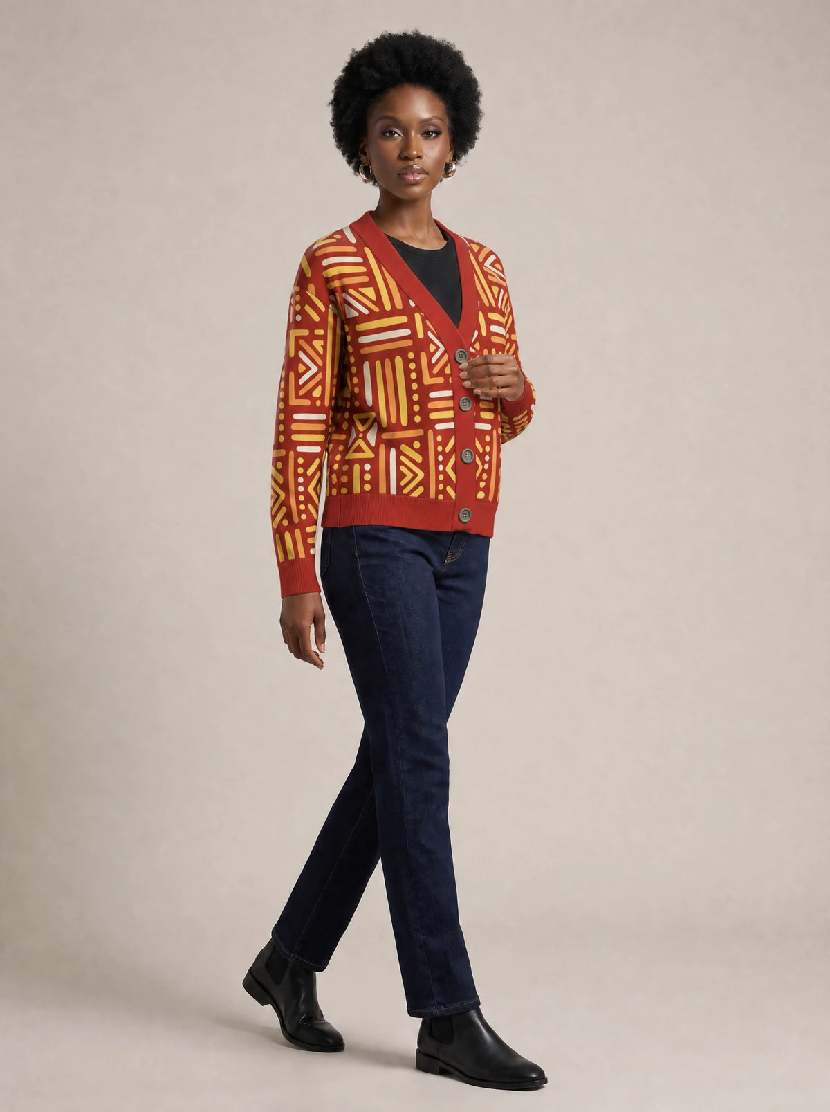 "Mistari" Cardigan — three-quarter view on model