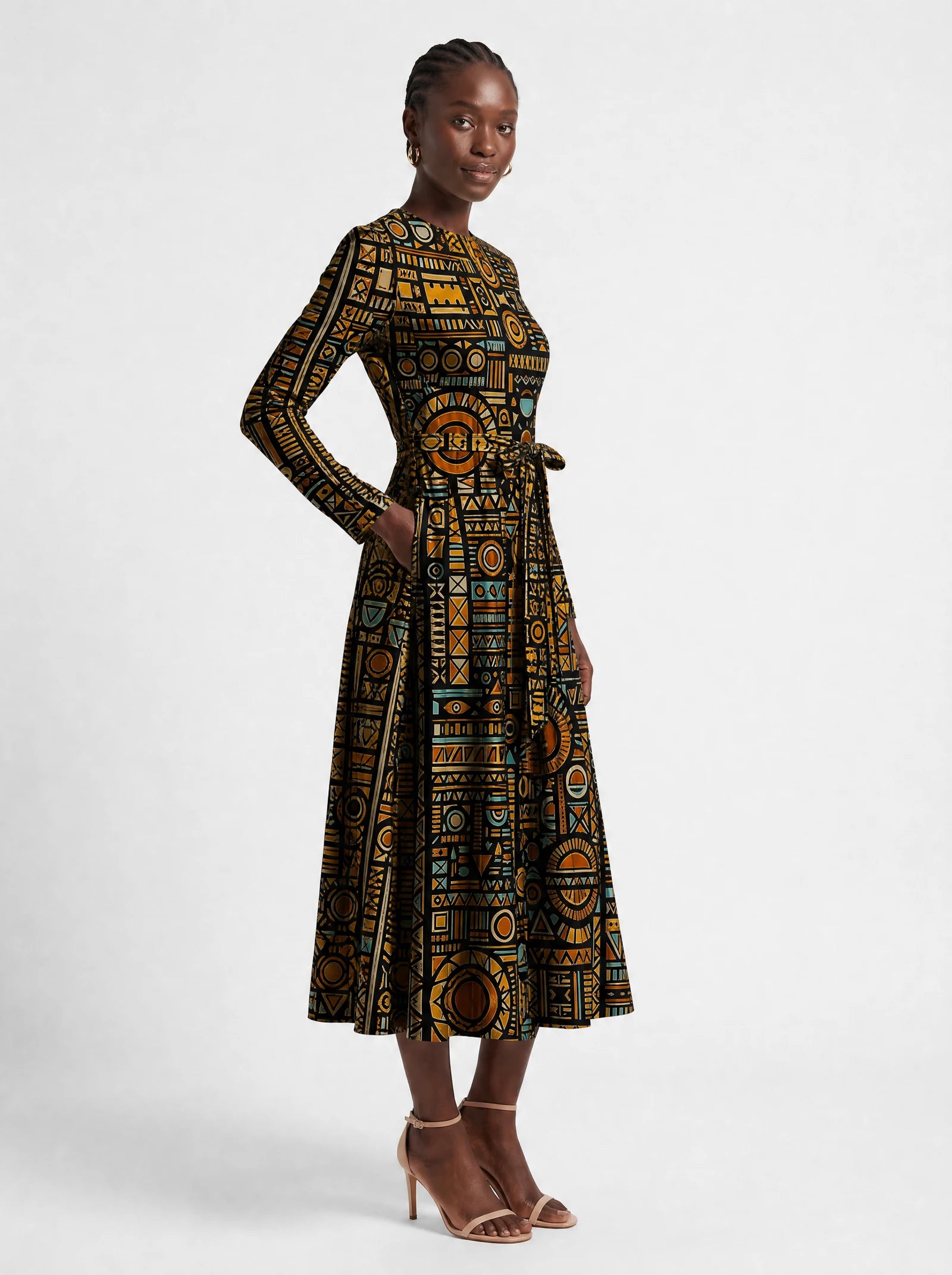 "Afrocentric Pattern" Viscose Midi Dress — three-quarter view on model, hand in the side pocket